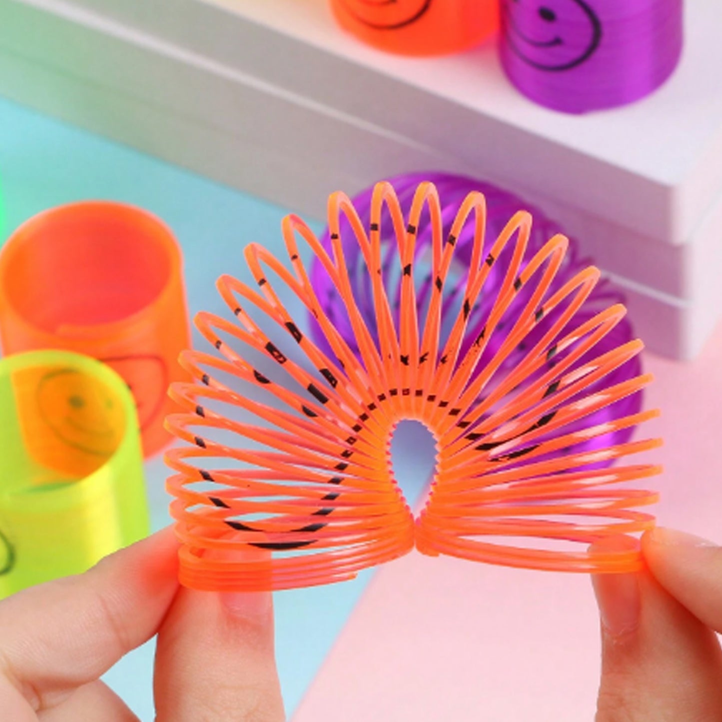 Multicolor Magic Smiley Slinkey (12 Pcs Set)