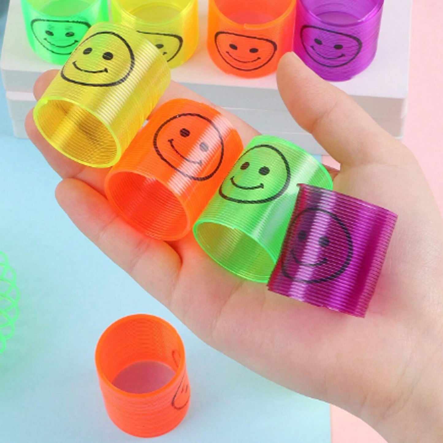 Multicolor Magic Smiley Slinkey (12 Pcs Set)